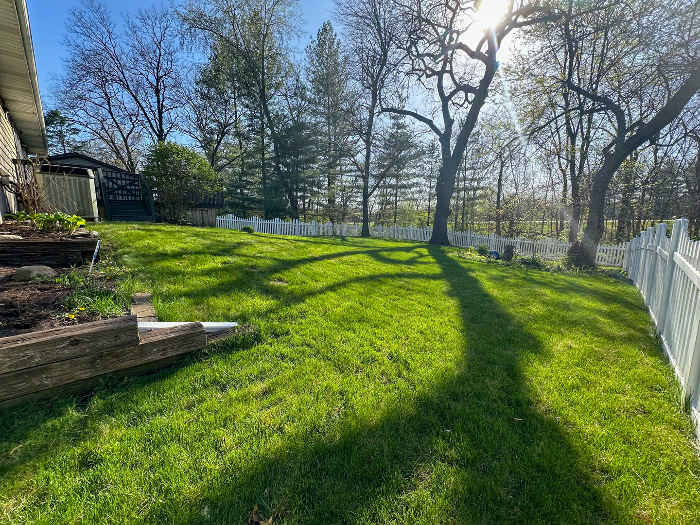 6315 North Post Oak Road Peoria, IL 61615 - Photo 27 of 31 a view of a backyard with large trees