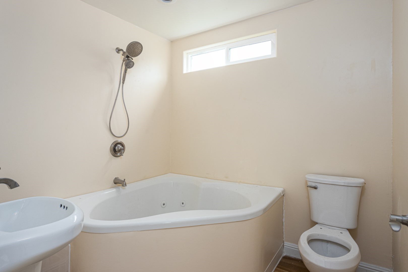 4580 Mamane Street Kapaa, HI 96746 - Photo 23 of 30 a white bath tub sitting next to a white toilet