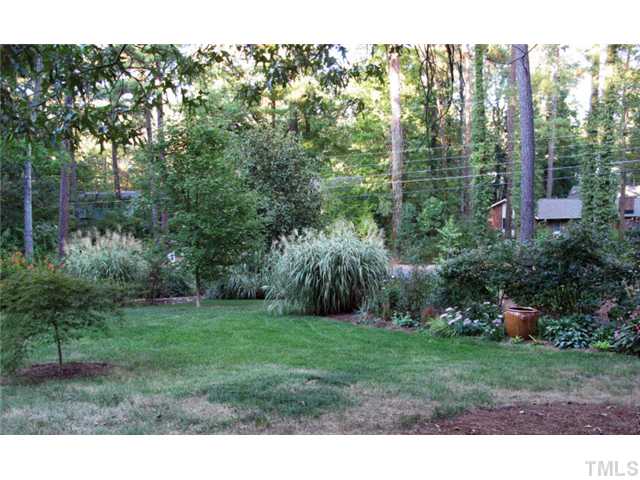 1105 Woodburn Road Durham, NC 27705 - Photo 11 of 11 Beautiful landscaping on the large corner lot