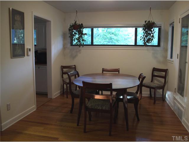 1105 Woodburn Road Durham, NC 27705 - Photo 3 of 11 The dining room flows into the living room