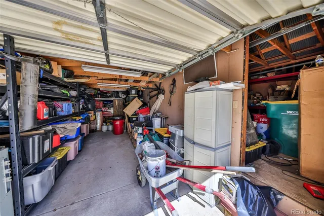 a view of balcony with wooden floor and fence