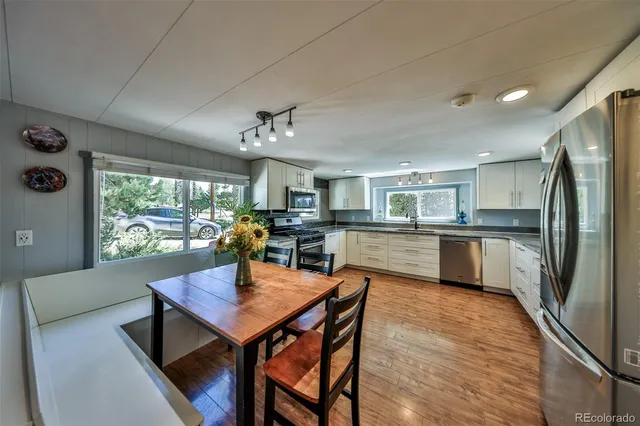 a view of livingroom with furniture and wooden floor