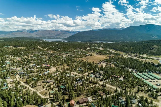 a view of a city with an ocean