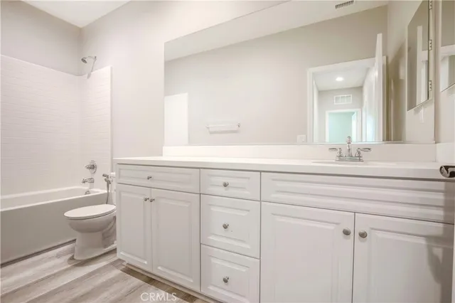 a view of a room that has a window in it