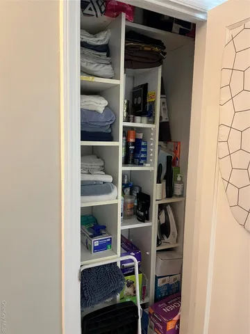 a room with storage and utility
