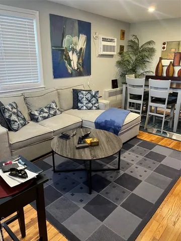 a living room with furniture and rug