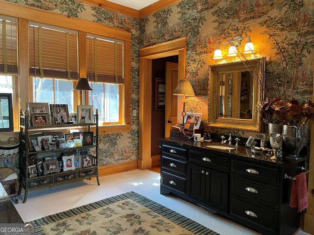 2106 Adams Street Vidalia, GA 30474 - Photo 14 of 47 a bathroom with a sink and a mirror