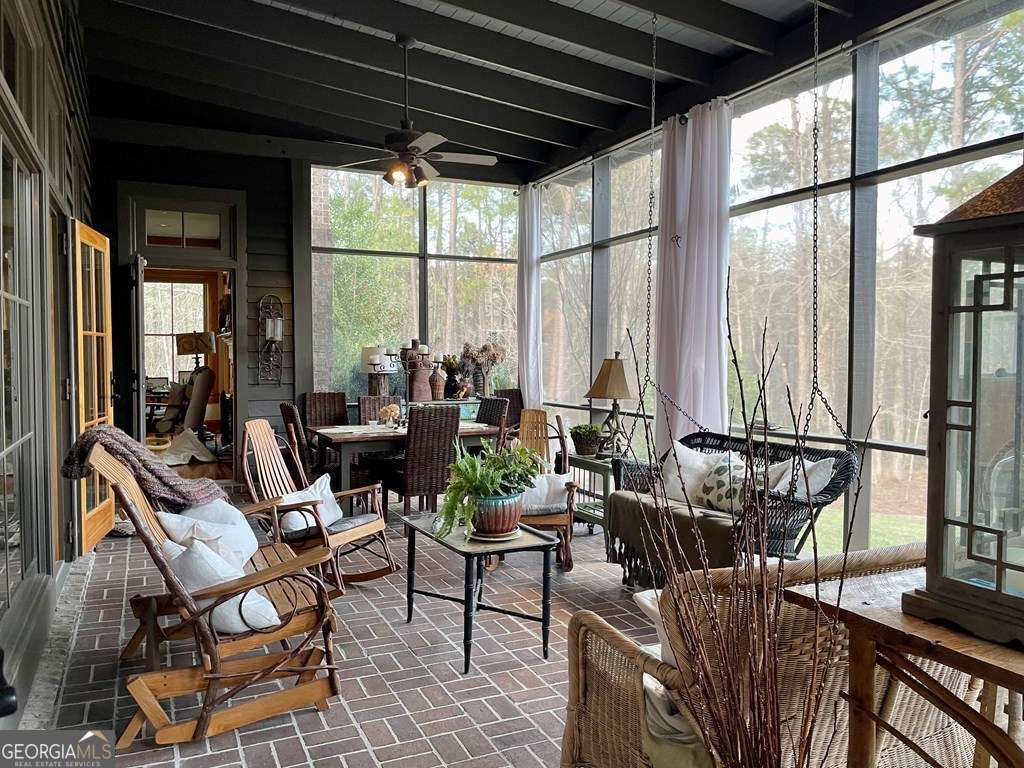 2106 Adams Street Vidalia, GA 30474 - Photo 25 of 47 a view of living room with furniture and floor to ceiling windows