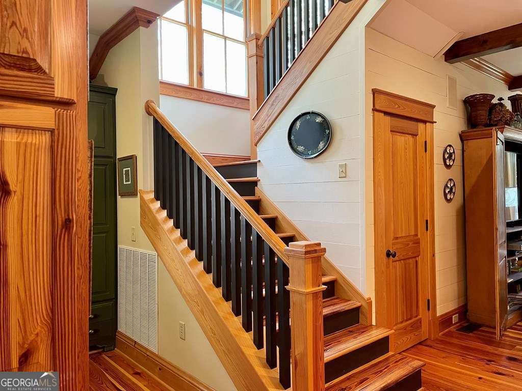 2106 Adams Street Vidalia, GA 30474 - Photo 29 of 47 a view of entryway and hall with wooden floor