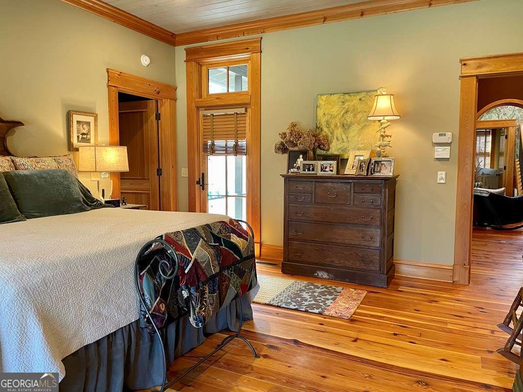 2106 Adams Street Vidalia, GA 30474 - Photo 35 of 47 a bedroom with a bed and a dresser