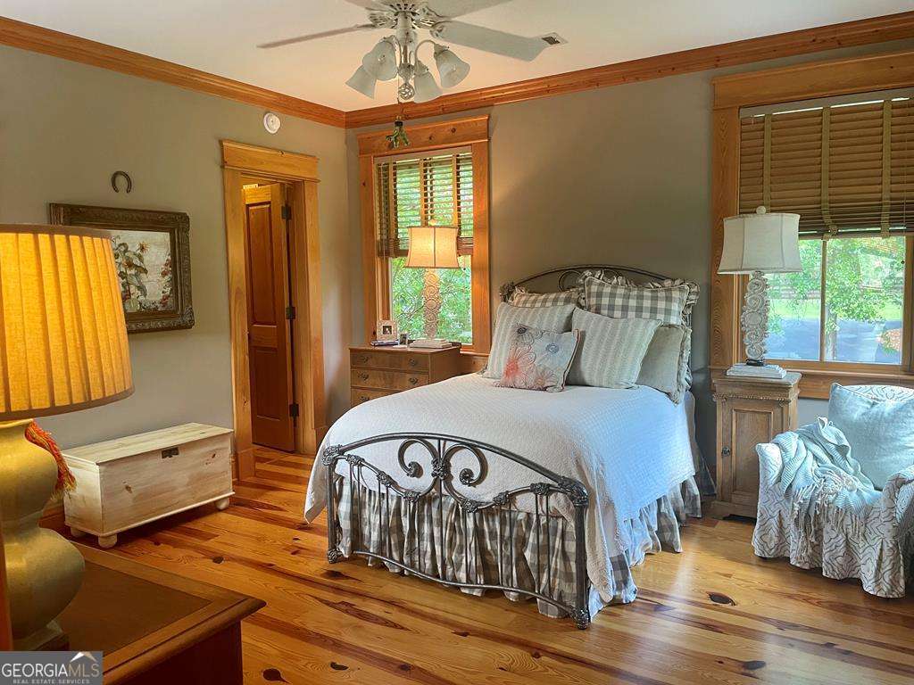 2106 Adams Street Vidalia, GA 30474 - Photo 38 of 47 a bedroom with furniture and a window