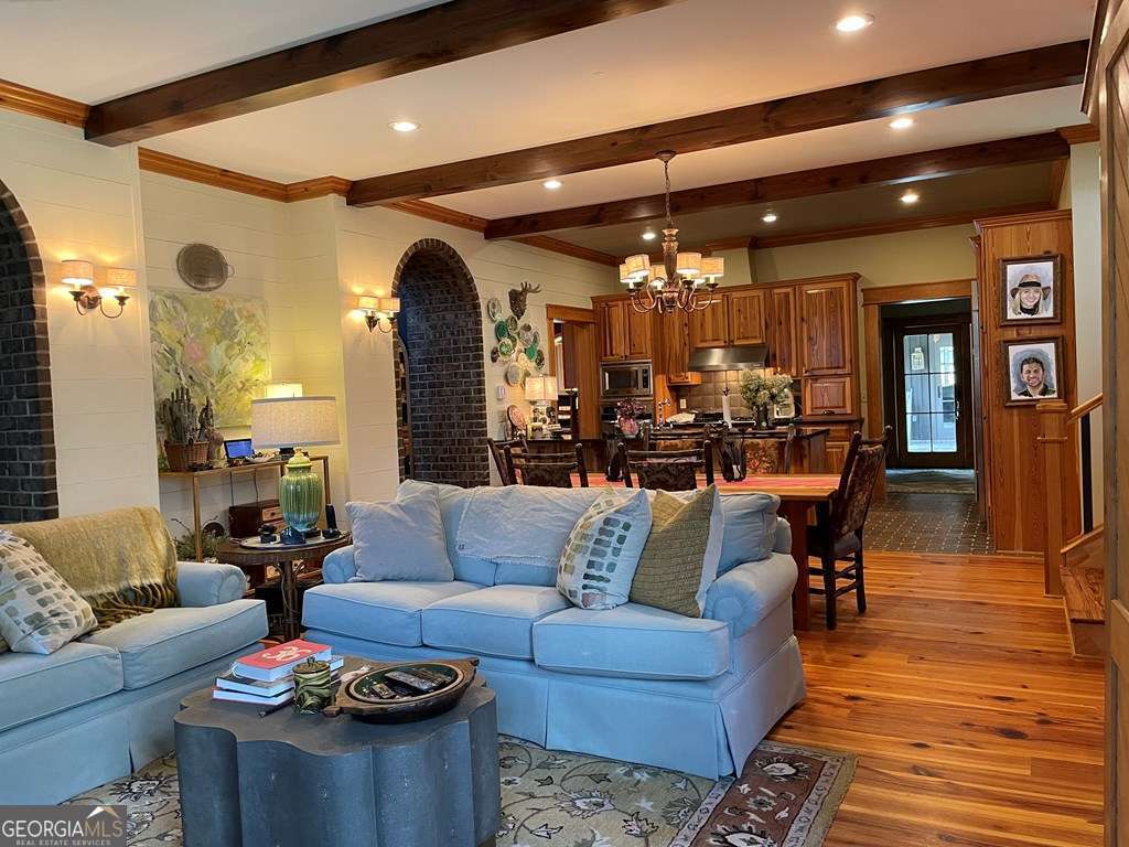 2106 Adams Street Vidalia, GA 30474 - Photo 6 of 47 a living room with furniture and wooden floor