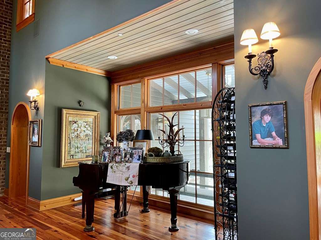 2106 Adams Street Vidalia, GA 30474 - Photo 7 of 47 a view of a dining room with furniture window and wooden floor