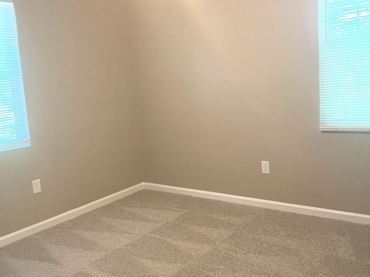 2109 Perry Road Memphis, TN 38106 - Photo 6 of 6 an empty room with a window