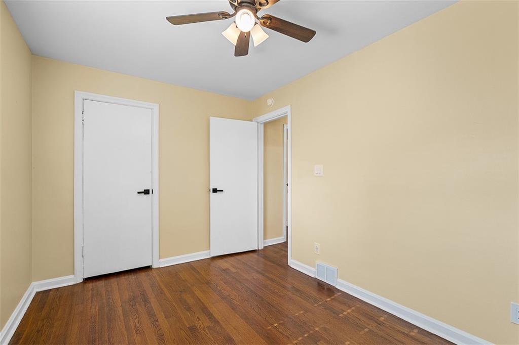 1858 Brodhead Road Aliquippa, PA 15001 - Photo 21 of 27 a view of an empty room with wooden floor