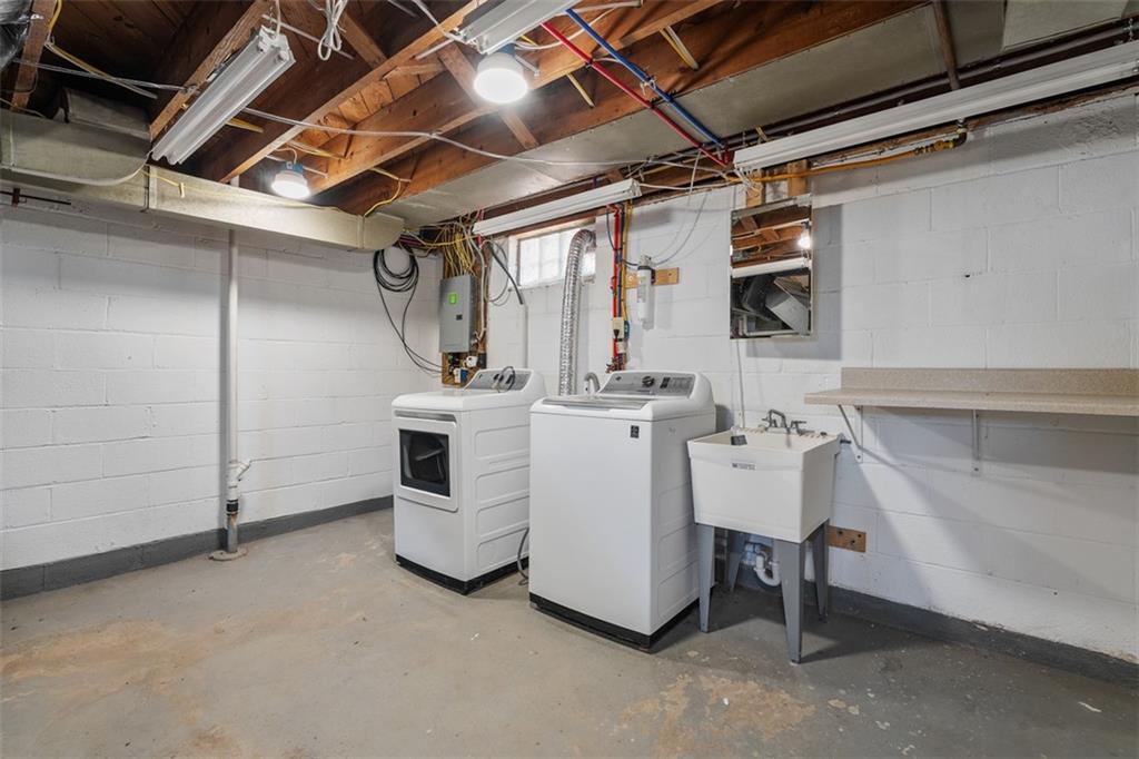 1858 Brodhead Road Aliquippa, PA 15001 - Photo 22 of 27 a utility room with dryer and washer