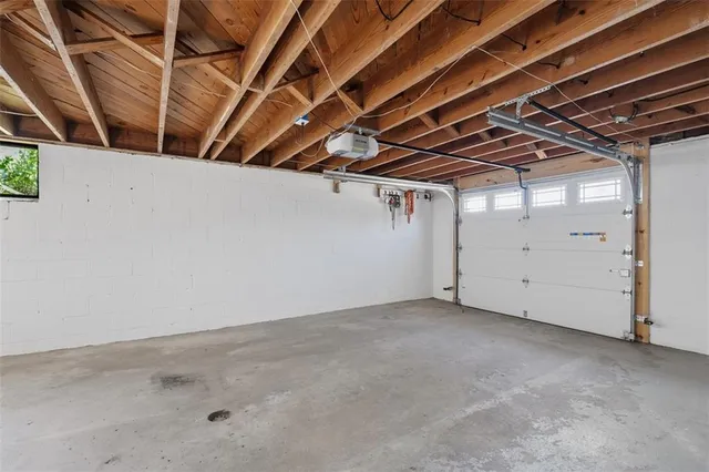 a view of a room with white walls