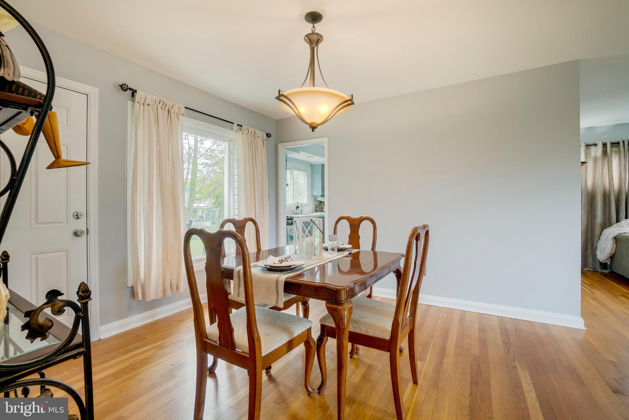 905 Sedgley Road Baltimore, MD 21228 - Photo 15 of 38 Dining Room w/door to patio area in rear yard