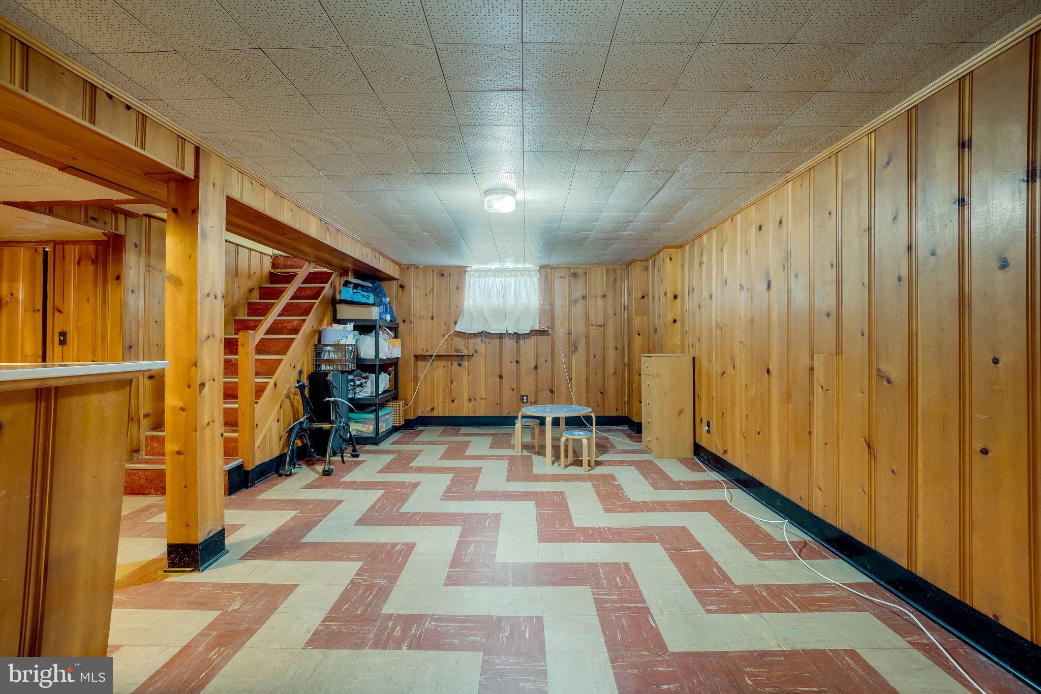 905 Sedgley Road Baltimore, MD 21228 - Photo 33 of 38 Knotty pine walls add character