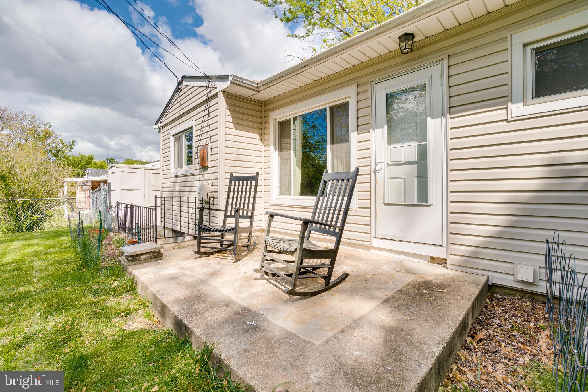 905 Sedgley Road Baltimore, MD 21228 - Photo 6 of 38 Patio area off Dining Room + steps to basement