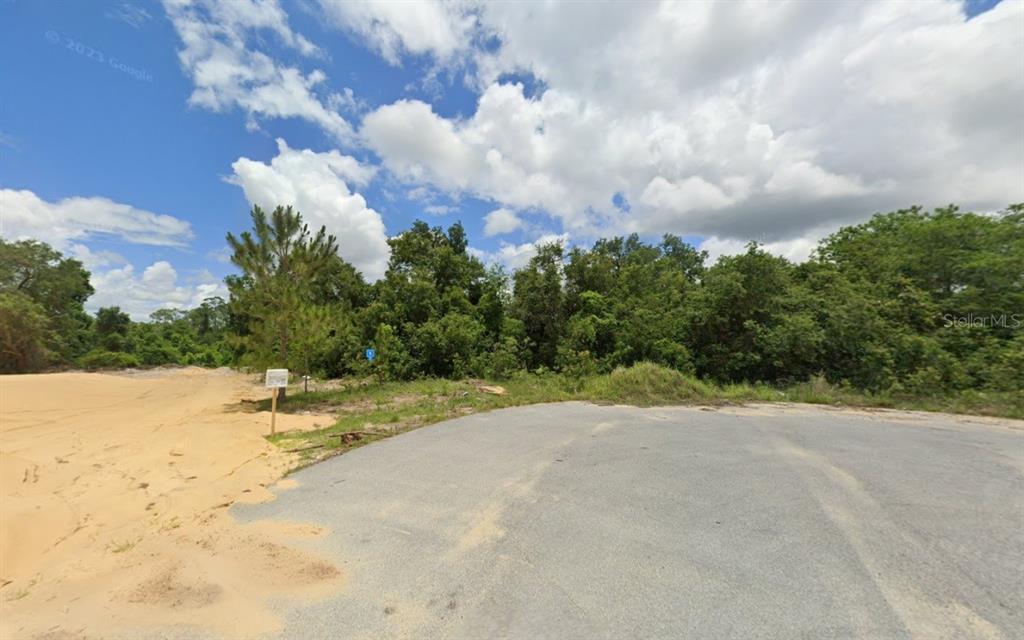 Trout Way Kissimmee, FL 34759 - Photo 1 of 1 a view of a beach with a yard