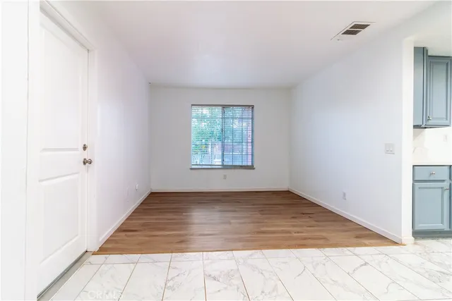 an empty room with windows