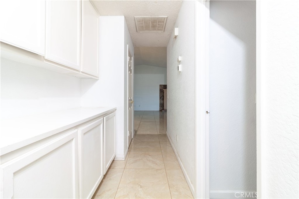 9668 East Ave R 14 Littlerock, CA 93543 - Photo 18 of 34 a view of a hallway