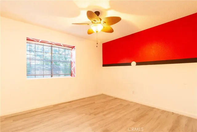 a view of a room with a large window