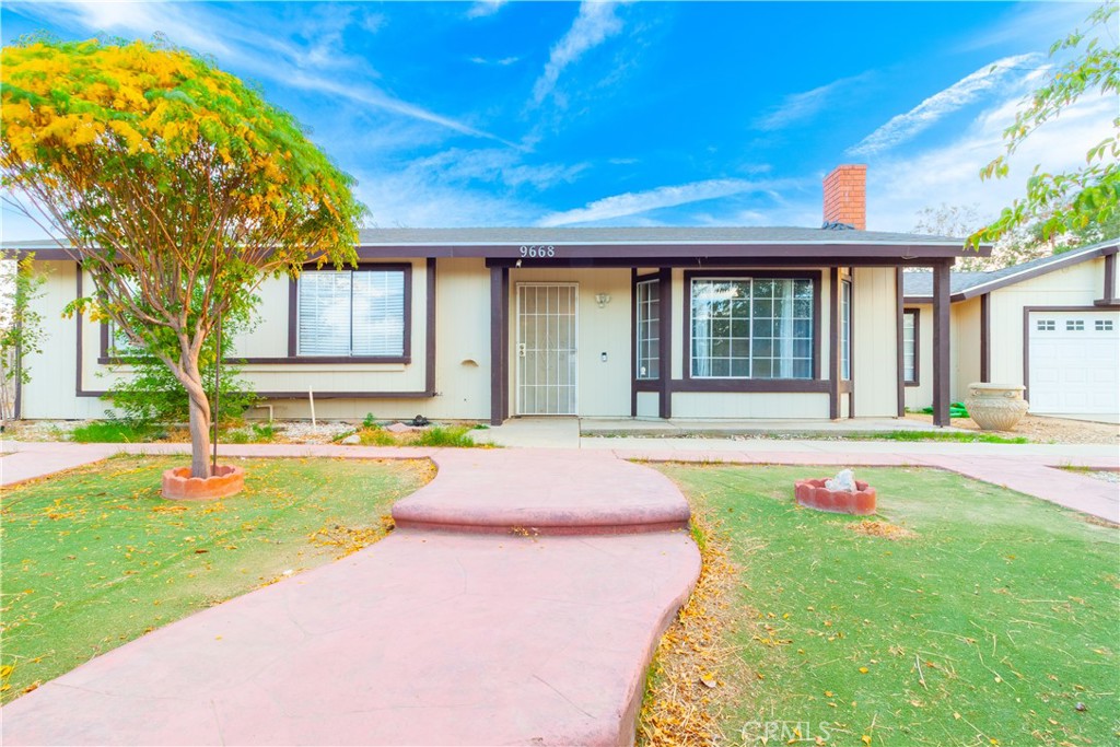 9668 East Ave R 14 Littlerock, CA 93543 - Photo 4 of 34 a swimming pool with patio outdoor seating and yard