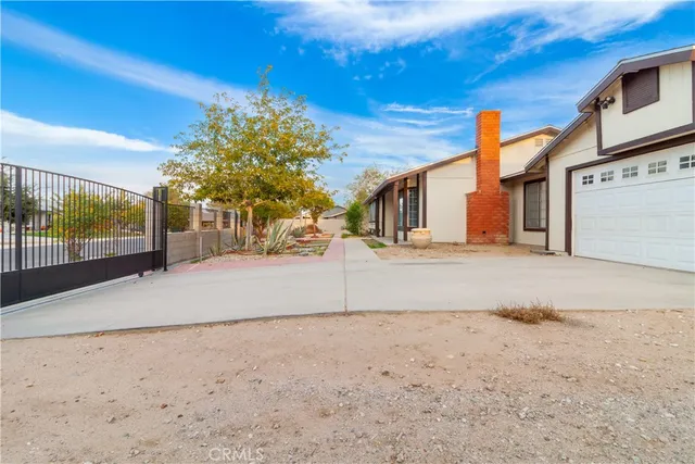 a view of a backyard of a house