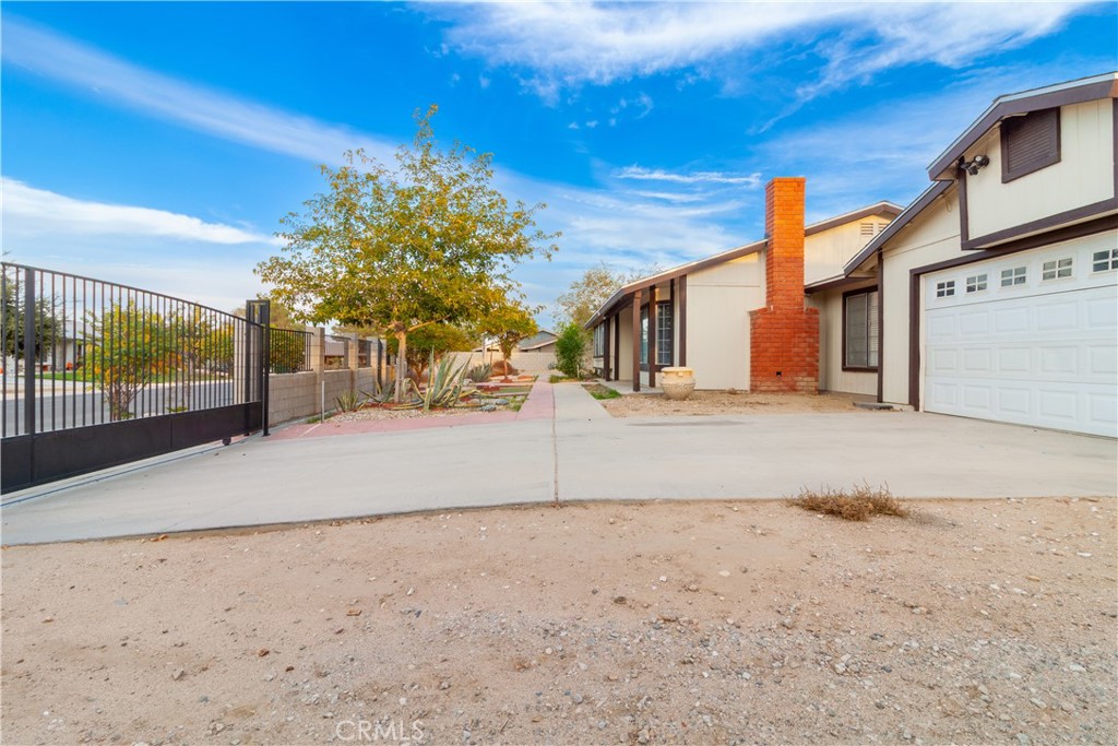 9668 East Ave R 14 Littlerock, CA 93543 - Photo 7 of 34 a view of a backyard of a house
