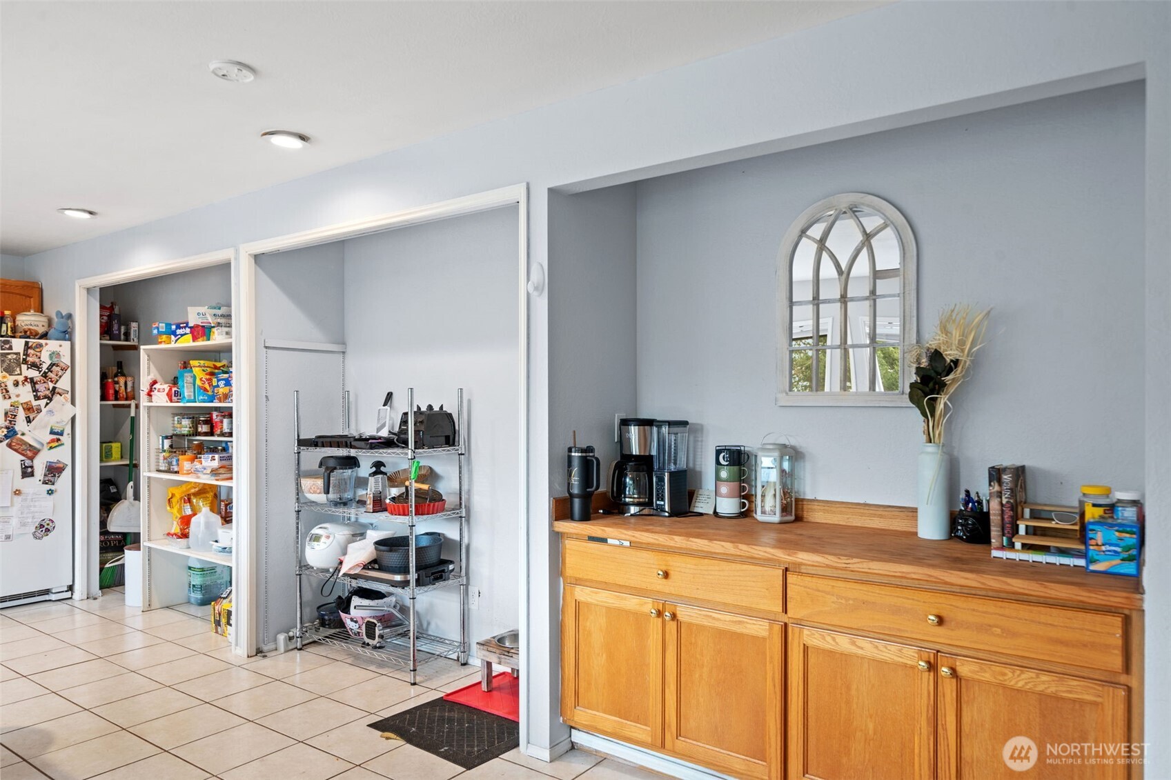 37399 Buck Road Northeast Hansville, WA 98340 - Photo 11 of 40 a kitchen with stainless steel appliances granite countertop a refrigerator and sink