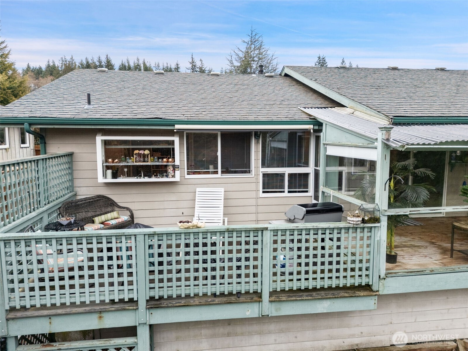 37399 Buck Road Northeast Hansville, WA 98340 - Photo 22 of 40 a house view with a garden space