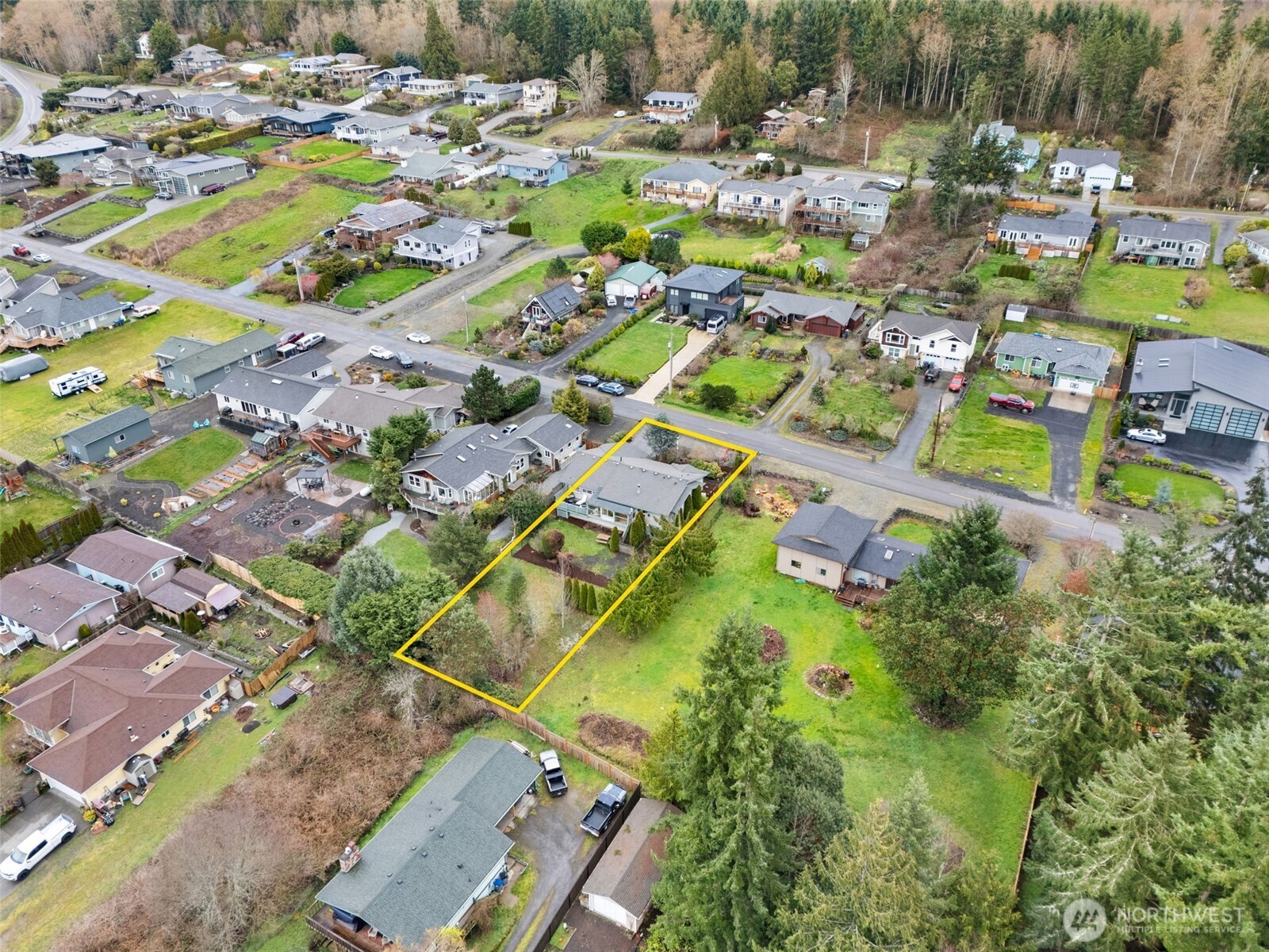 37399 Buck Road Northeast Hansville, WA 98340 - Photo 33 of 40 a aerial view of residential houses with outdoor space