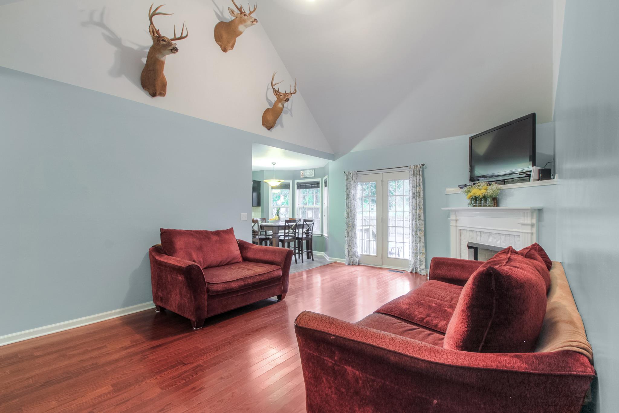 2832 Rippavilla Way Spring Hill, TN 37174 - Photo 3 of 14 a living room with furniture a ceiling fan and a window