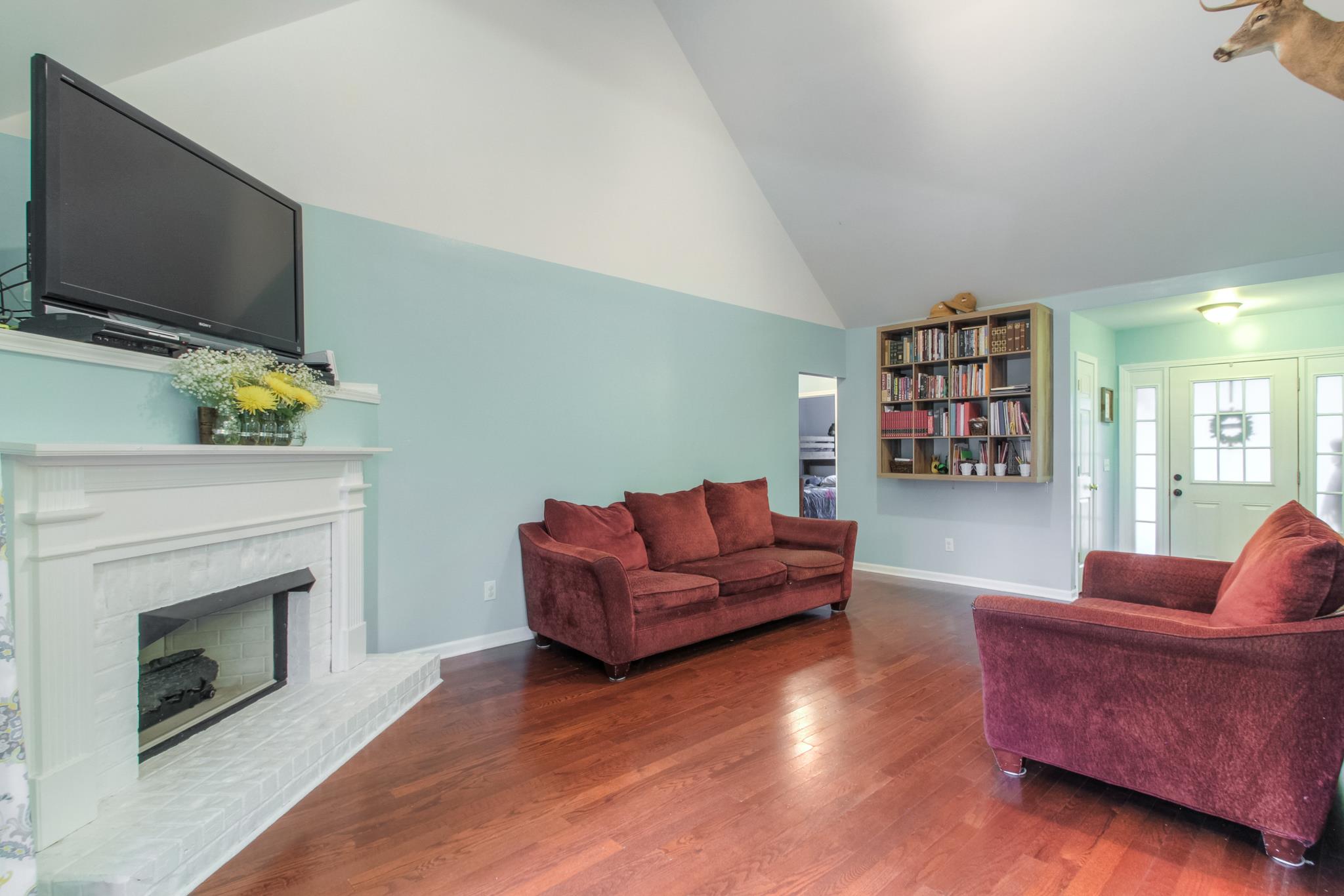 2832 Rippavilla Way Spring Hill, TN 37174 - Photo 4 of 14 a living room with furniture and a fireplace