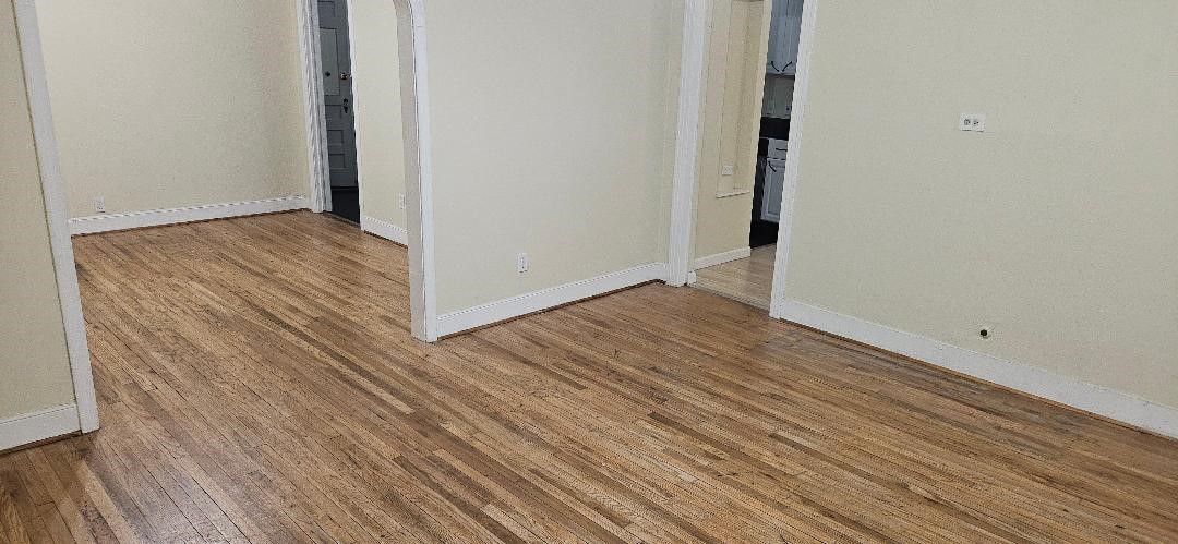 932 Walling Street Houston, TX 77009 - Photo 7 of 14 a view of a room with wooden floor