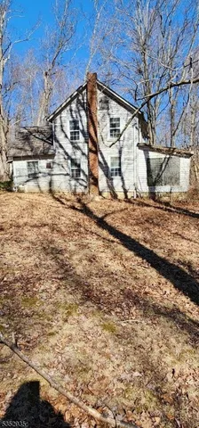 a view of a backyard of a house