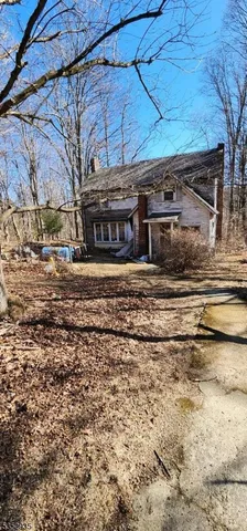 a view of a house with a bed