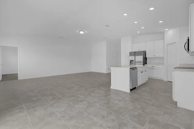 a view of a kitchen with a sink
