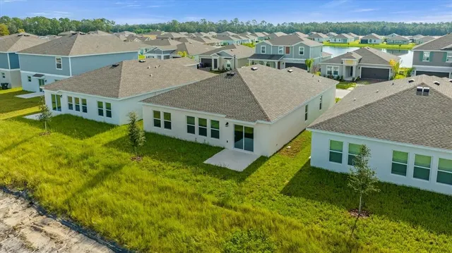 a view of a lake with a big yard