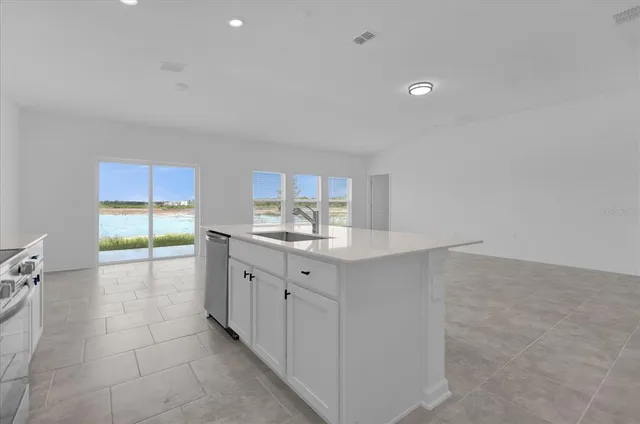 a bathroom with a double vanity sink and mirror