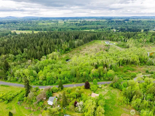 a view of a yard with an outdoor space