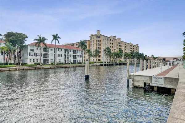a view of a lake with building in front of it