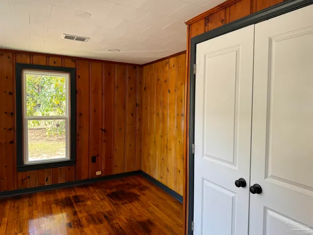 a view of an empty room and window