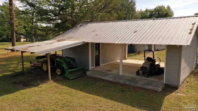 a front view of a house with yard