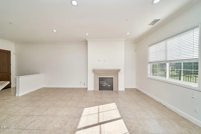 a view of a hallway with an entryway