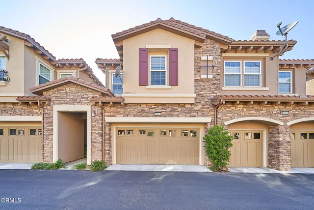 front view of a house with a street