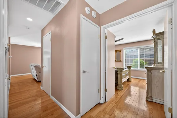 a bathroom with a sink toilet vanity and tub