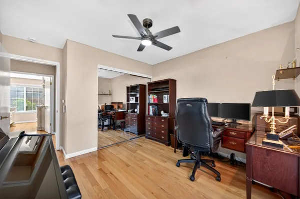 a spacious bathroom with a double vanity sink a mirror and a shower